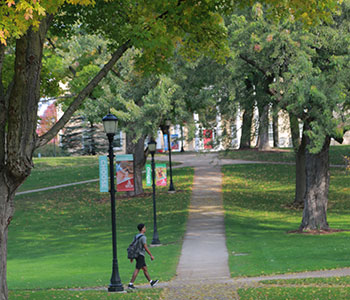 Students walking on campus. Link to Gifts of Real Estate